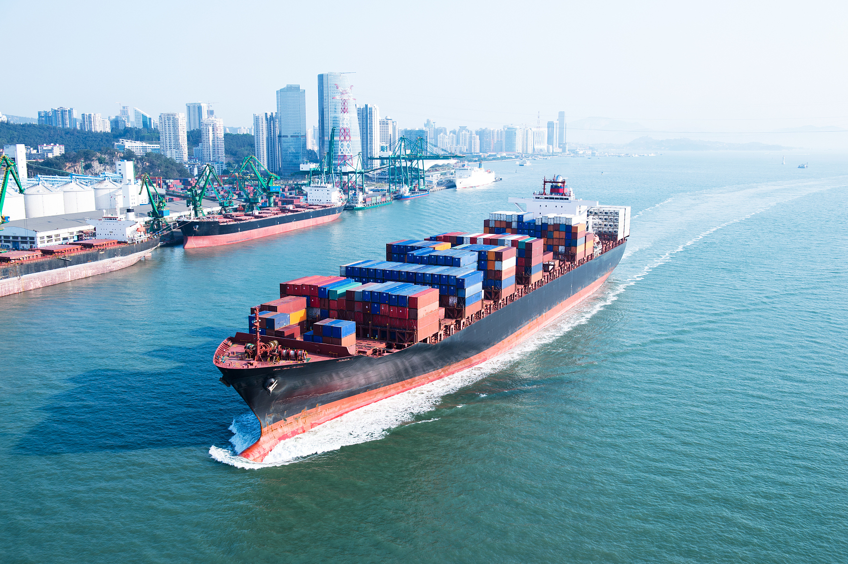 Logistics professional checking customs documentation for air freight